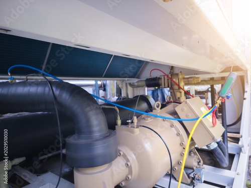 Check valve position for checking pressure and filling the chiller compressor refrigerant