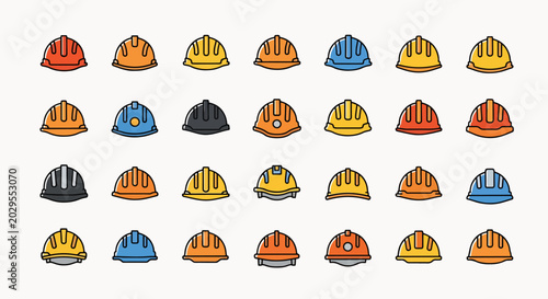 Collection of colorful construction hard hats in a grid layout, safety equipment for building and industrial work