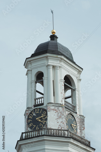 Εκτύπωση καμβά A clock tower with a distinctive weather vane at the top, ideal for use in archi