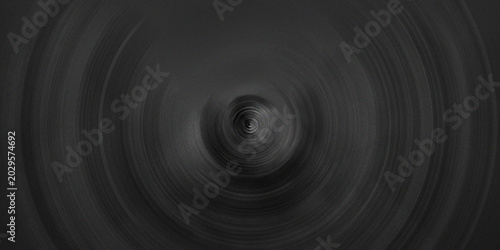 Foto Abstract dark gray background with concentric circles and radial blur creating a subtle hypnotic effect