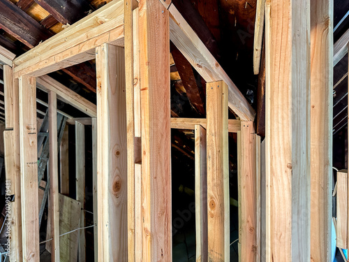 Slika na platnu Wooden framing creating new room structure during home renovation