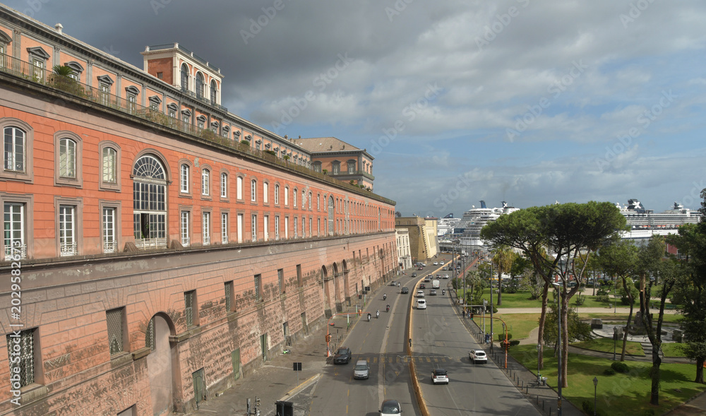 Obraz premium The Royal Palace of Naples is a historic building situated in Piazza del Plebiscito, in the historic centre of Naples. The façade is in the late Renaissance style. The interior is Baroque and Neoclass