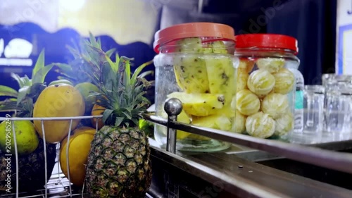 Refreshing Juice Shop During Summer with Fresh Fruit Drinks, Colorful Beverages, Street Refreshment and Tropical Lifestyle Scene
