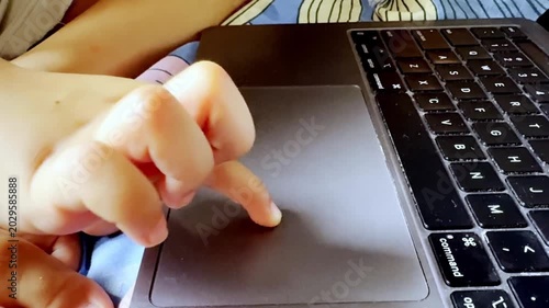 Little Girl Working on MacBook Laptop with Keynote Presentation, Computer Mouse, Technology Learning and Modern Education Environment Scene