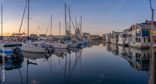 Fisherman's Wharf at sunset with boats and floating houses - Victoria, BC, Canada