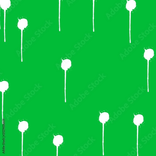 White Paint Splatter Pattern on Bright Green Background