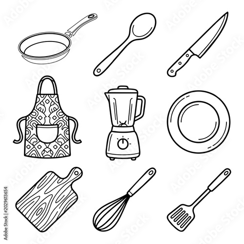 Kitchen utensils and tools arranged on a clean surface for cooking