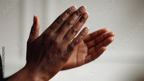 African American Hands Clapping in Slow Motion Close Up Detail