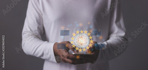 Young man hand using smartphone to Interconnect, Interconnected Concept; People connect via wireless internet in a world of digital technology and communications that connect freely around the world