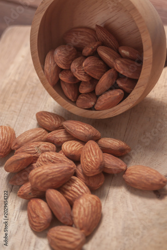 Almond snack fruit in wooden bowl