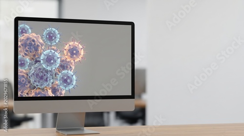 Desktop monitor displaying infectious virus cell modeling for virology research