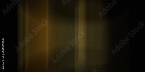 Fotografía Dark abstract background with vertical soft glowing golden light beams against pitch black space creating mysterious ambience