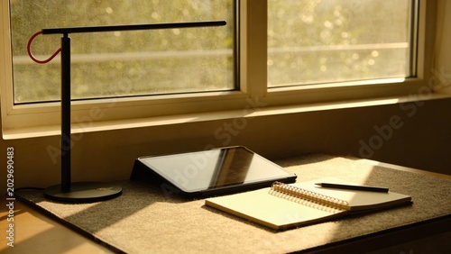 Cozy Workspace with Desk and Tablet