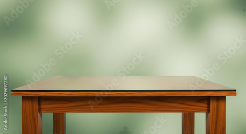 Minimalist wooden table with glass top against green wall