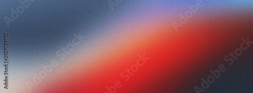 Photos Abstract image featuring a dynamic gradient of red, blue, and orange hues, evoking a sense of fluid motion and vibrant energy