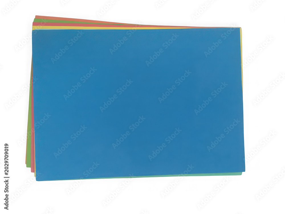 Fototapeta premium Stack of colorful construction paper sheets for art and craft projects isolated on white background