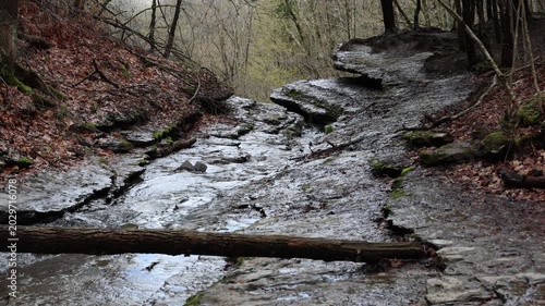 Water flowing through a rock run just before cascading over a waterfall