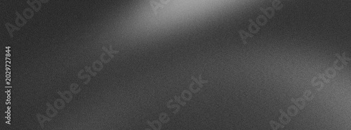 Foto Dark grey abstract background with subtle grainy texture and soft light gradient across upper left corner, moody atmospheric backdrop