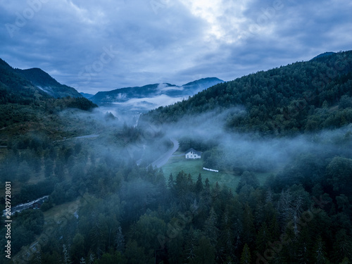 Late afternoon, afterrain landscape of Telemark province, Norway.