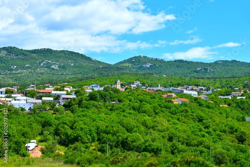 Photography View of Hreljin village bellow the forest covered hills in Primorje, Croatia