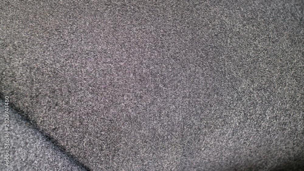 Fototapeta premium Gray textured natural fabric showing textile weave pattern
