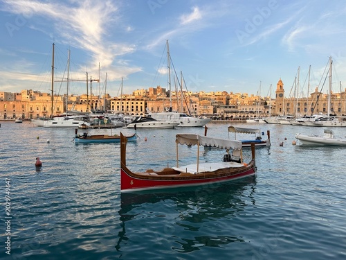 Traditional Maltese Luzzu boat in Grand Harbour of Valletta, Senglea, Malta, May 2025