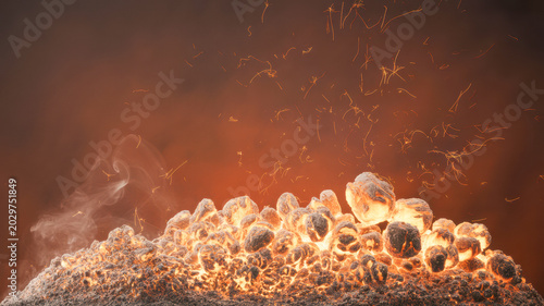 Glowing hot charcoal embers burning intensely in a dark fire pit creating bright orange sparks and rising white smoke clouds