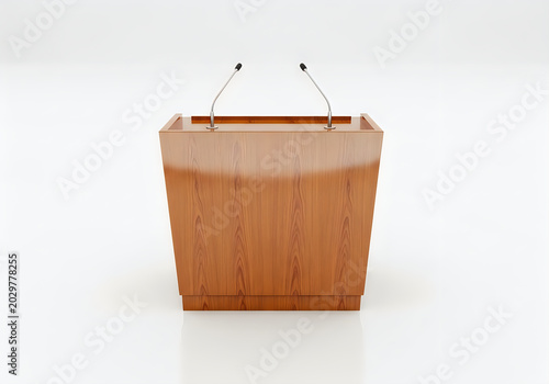Wooden podium with two microphones for public speaking