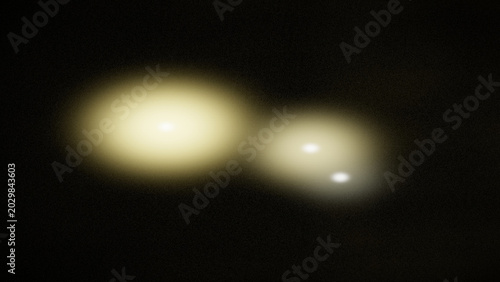 Canvas Print Two glowing orbs in a dark space