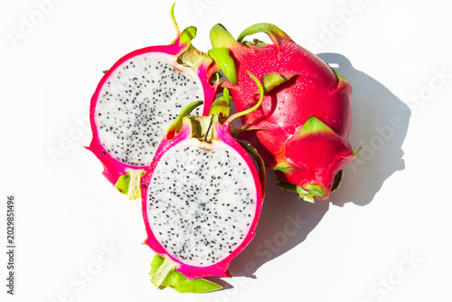 Dragon Fruit Halves on White Background Top View Minimal Composition