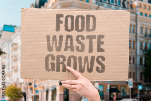 Fotografie "Food Waste Grows" Discarded groceries increase unnecessary environmental strain across crowded urban distribution chains yearly