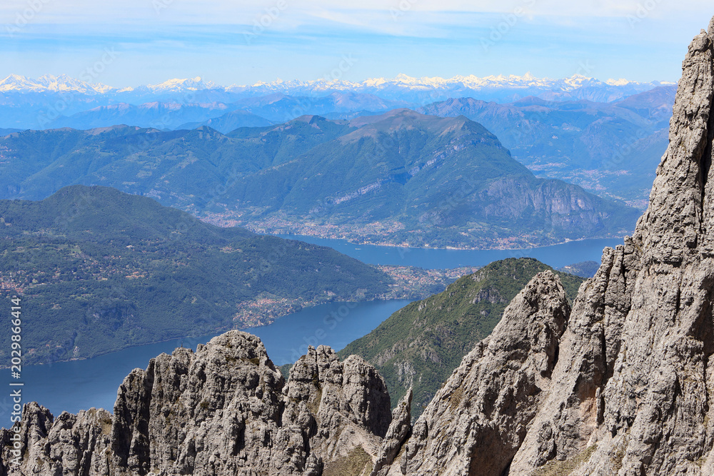 Obraz premium Panoramic aerial view of Lake Como and Alpine mountains from top of Grigna Meridionale in northern Italy
