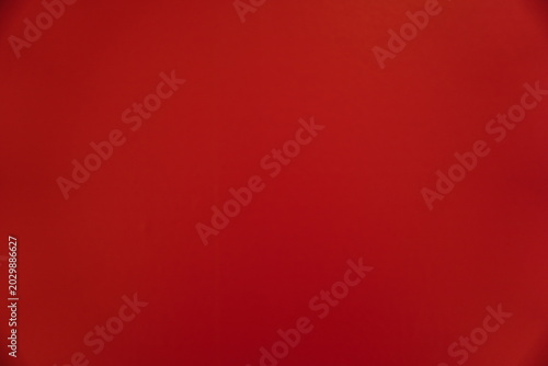 Canvastavla A solid crimson red surface with subtle vignetting and a fine matte texture
