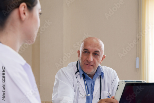Team doctor talking and discussing in surgery treatment patient’s case in meeting room office at hospital. healthcare and medical concept.