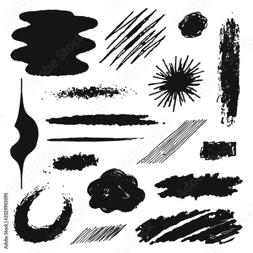 Black ink brush strokes and splatters collection on white background