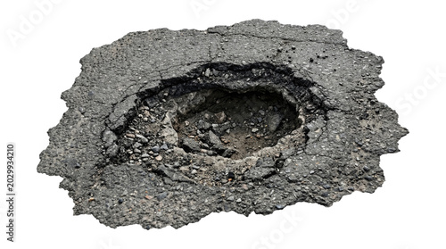Large deteriorated asphalt pothole with crumbled edges, exposed gravel and debris isolated on transparent background