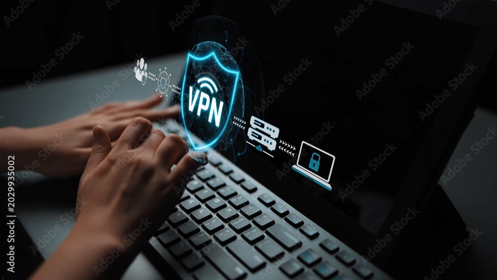 Fototapeta premium Secure Your Online Presence with a VPN Connection Displayed on a Laptop Screen While Hands Operate the Keyboard in a Dark Environment Sigmoid