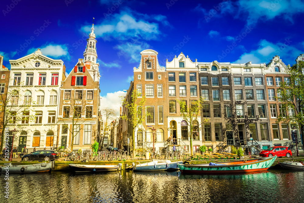 Fototapeta premium Houses facades over canal water, Amsterdam, Netherlands