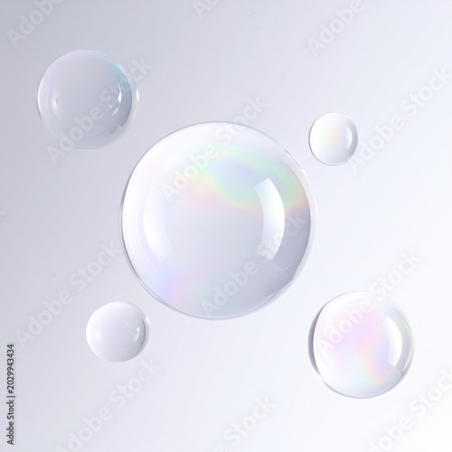 Floating iridescent soap bubbles against a soft, diffused light background