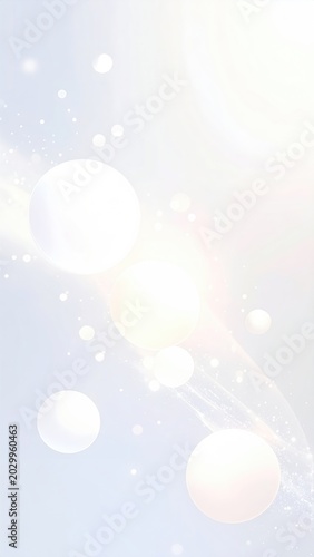 Soft, glowing spheres and delicate light particles drift in a gentle, luminous glow