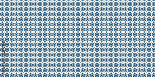Seamless pattern of blue floral motifs