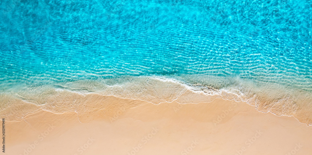 Obraz premium Aerial turquoise ocean beach shore stunning breathtaking dreamy serene paradise exotic coastal tropical island travel destination summer vacation idyllic scenic crystal clear drone overhead top view 