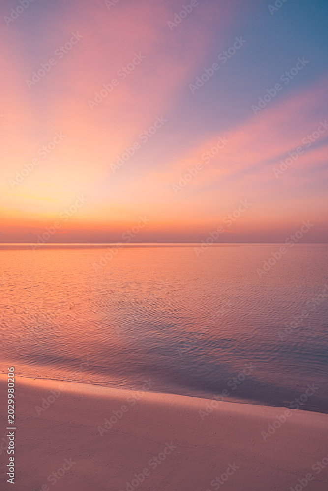 Fototapeta premium Tropical beach sunset pink sky stunning breathtaking dreamy ethereal luminous serene paradise exotic coastal island travel destination summer vacation idyllic romantic twilight warm pastel glow scenic