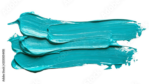 Фотография Thick turquoise paint strokes with visible texture, isolated on transparent back