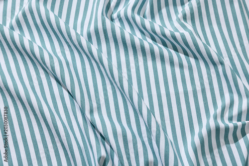 Blue and White Striped Linen Tablecloth Texture Background. Top View