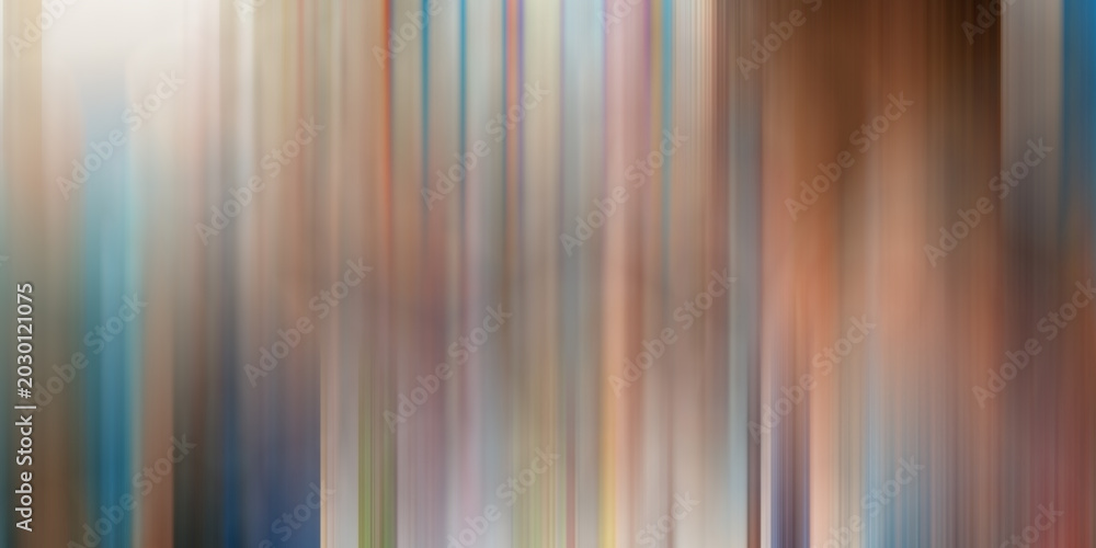 Obraz premium Abstract vertical motion blur background with colorful streaks