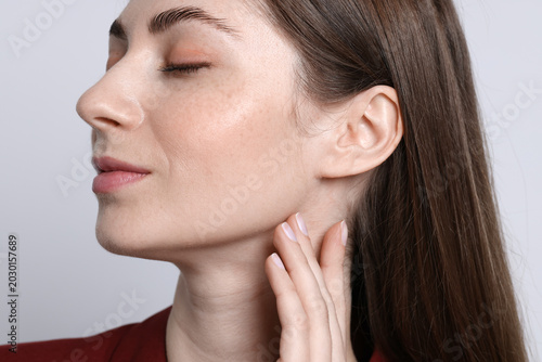 Fotografie Woman with normal skin on light background
