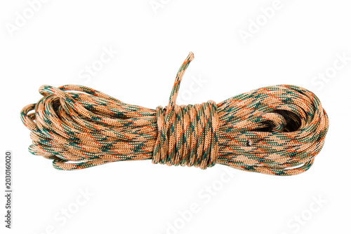 Fotografie Skein of synthetic multicolored rope on a white background.
