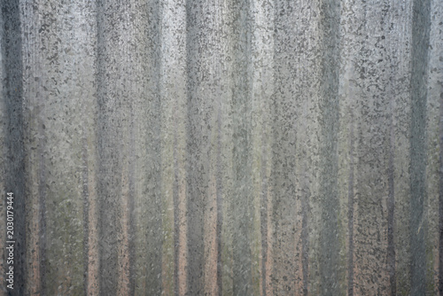 Photography Close up background texture of corrugated galvanized steel sheet, showing grey metallic zinc coating pattern with horizontal lines and spangle crystallization