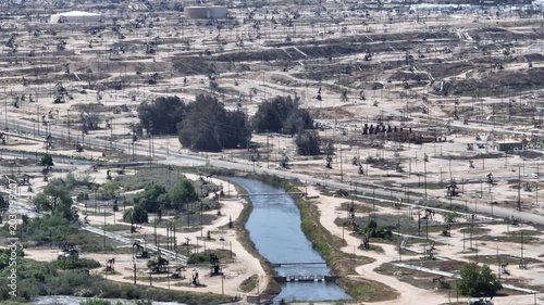 Large Scale Oil Extraction Pump Jacks Bakersfield California Aerial Footage
